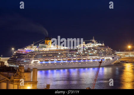 Costa Fascinosa cruise ship at night in Barcelona port, Catalonia, Spain Stock Photo
