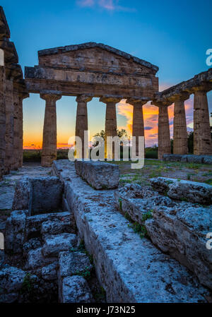 Paestum was a major ancient Greek city on the coast of the Tyrrhenian Sea in Magna Graecia (southern Italy). The ruins of Paestum are famous for their Stock Photo