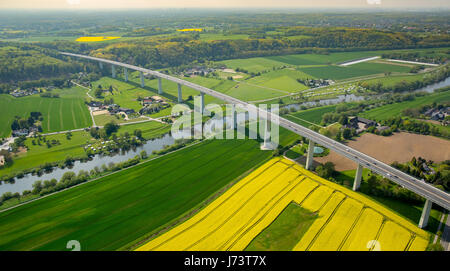 Ruhrtal bridge, Mintarder bridge over the Ruhr, A52 motorway, yellow rapeseed field, Ruhr valley, Mülheim an der Ruhr, Ruhr area, North Rhine-Westphal Stock Photo