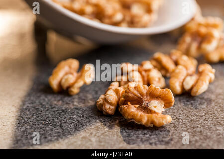 Walnuts on the kitchen table Stock Photo