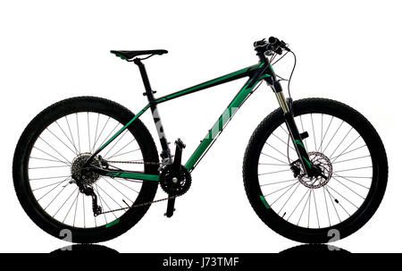 one caucasian man practicing man mountain bike bking isolated on white background with shadows Stock Photo