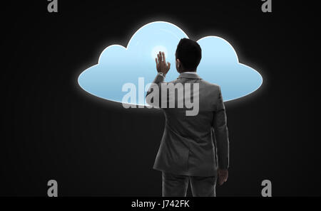 businessman working with virtual cloud projection Stock Photo