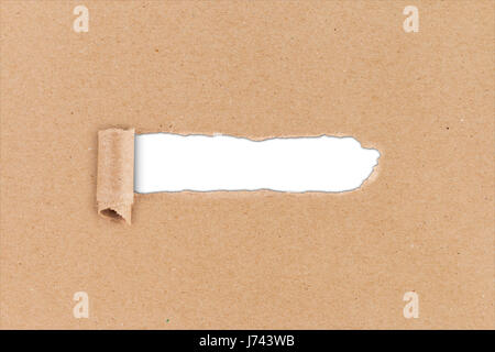 think outside the box business concept ripped hole in brown paper on white background Stock Photo