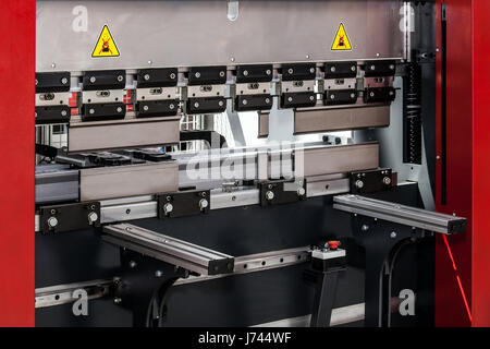 Automatic bending and folding metal sheet machine Stock Photo