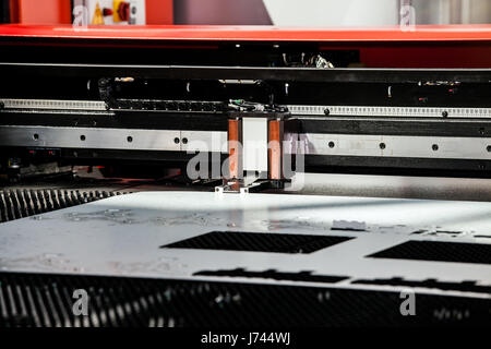 Metal sheet punching machine Stock Photo