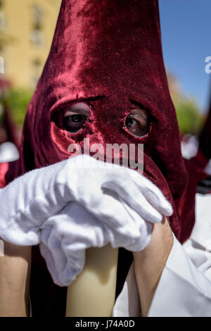 Penitent with red hood in Easter procession in Northern Spain Stock ...
