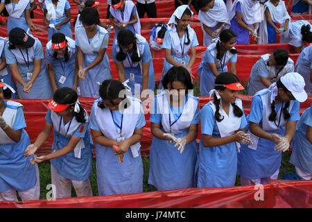 Students wash hands at Residential Model School in Dhaka marking Global Hand Washing Day 2010 jointly organised by UNICEF, Public Health & Engineering Stock Photo