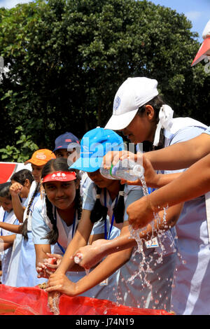 Students wash hands at Residential Model School in Dhaka marking Global Hand Washing Day 2010 jointly organised by UNICEF, Public Health & Engineering Stock Photo