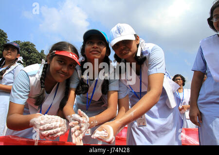 Students wash hands at Residential Model School in Dhaka marking Global Hand Washing Day 2010 jointly organised by UNICEF, Public Health & Engineering Stock Photo