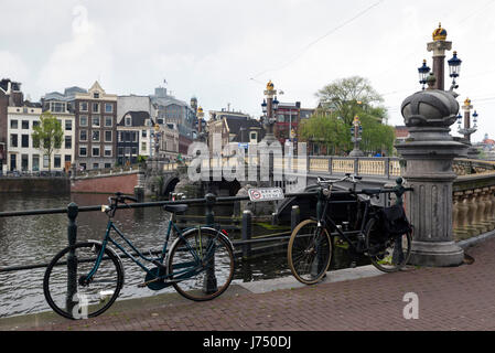 AMSTERDAM, NETHERLANDS - MAY, 13, 2017: The city on a cloudy spring day Stock Photo