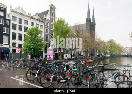 AMSTERDAM, NETHERLANDS - MAY, 13, 2017: The city on a cloudy spring day Stock Photo