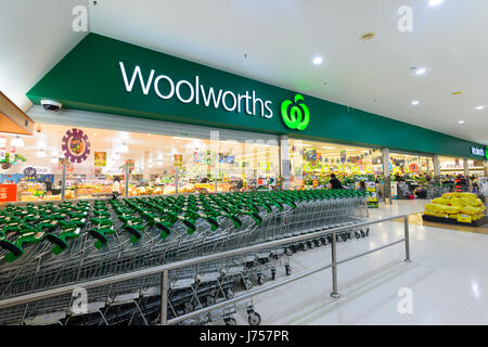 Rows of shopping trolleys outside Woolworths, Kiama, New South Wales, NSW, Australia Stock Photo