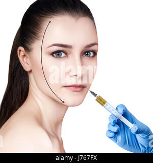 Beautiful woman gets injection in her lips. Stock Photo