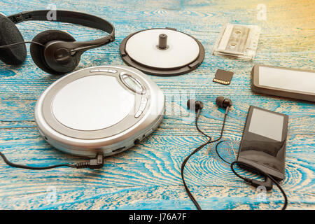 The photo shows a Cd player on a blue background Stock Photo