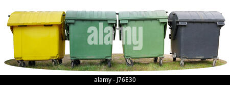 Four big isolated plastic trash bin are located on a green grass. Color of objects - yellow, green and black. Panoramic collage from several photos Stock Photo
