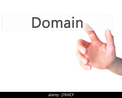 Domain - Hand pressing a button on blurred background concept . Business, technology, internet concept. Stock Photo Stock Photo