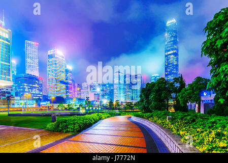 HONG KONG, CHINA - APRIL 25: View of skyscrapers and architecture from Tamar park in the financial district of Hong Kong at night on April 25, 2017 in Stock Photo