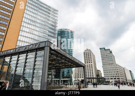 Berlin, Germany - April 12, 2017: Potsdamer Platz railway station with modern new skyscrapers and people walking in Berlin, Germany Stock Photo