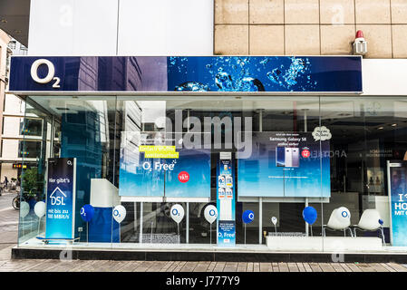 Dusseldorf, Germany - April 16, 2017: O2 shop in Dusseldorf, Germany. O2 is a European telecommunications company, specialized in mobile telephony own Stock Photo