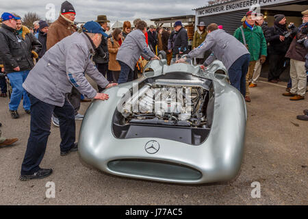 1954 Mercedes W196 Streamliner with mechanics in the paddock at the Goodwood GRRC 74th Members Meeting, Sussex, UK. Stock Photo