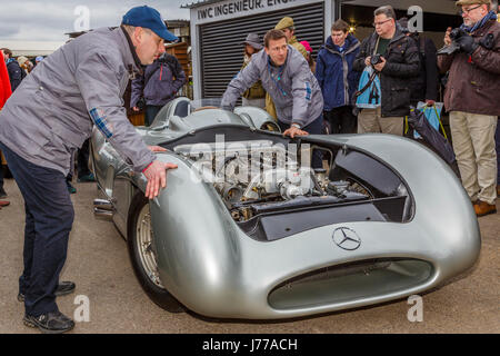 1954 Mercedes W196 Streamliner with mechanics in the paddock at the Goodwood GRRC 74th Members Meeting, Sussex, UK. Stock Photo