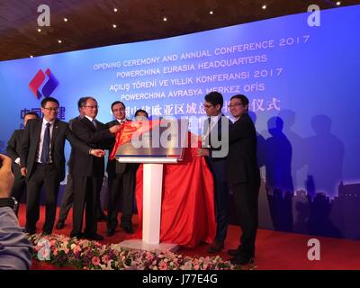 Istanbul, Turkey. 23rd May, 2017. Guests inaugurate PowerChina Eurasia headquarters in Istanbul, Turkey, on May 23, 2017. The Power Construction Corporation of China on Tuesday marked the opening of its Eurasia headquarters in Istanbul in efforts to further integrate into the Eurasian market. Credit: Yi Aijun/Xinhua/Alamy Live News Stock Photo