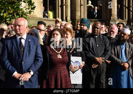 Manchester, UK. 23rd May, 2017. Faith and city leaders at a vigil in Manchester's Albert Square to pay their respects following the terrorist attack on Manchester Stadium. Alongside large crowds, Manchester Mayor Andy Burnham, Home Secretary Amber Rudd, Labour leader Jeremy Corbyn and Lib Dem leader Tim Farron also attended. Credit: Jacob Sacks-Jones/Alamy Live News.
