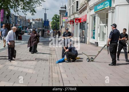 Cardiff, Wales, UK. 24th May, 2017.. Police carry out security checks on manholes in Cardiff City Centre ahead of the Champions League Final on June 3rd.   Picture by Mark Hawkins Credit: Mark Hawkins/Alamy Live News Stock Photo