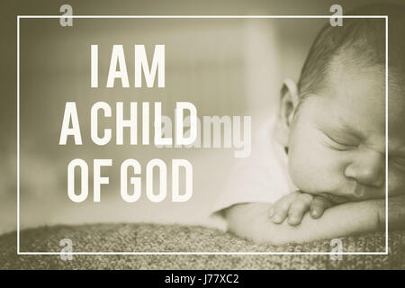 Newborn baby boy lying on bed, sleeping, close up Stock Photo