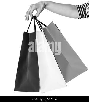 Shopping. The French way. Closeup on hands with shopping bags of the colours of the French flag isolated on white background Stock Photo