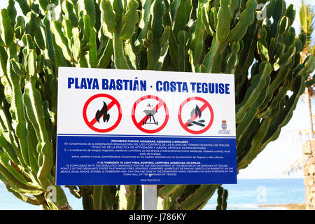 Playa Bastian sign on the beach, Costa Teguise, Lanzarote, Canary Islands Europe Stock Photo