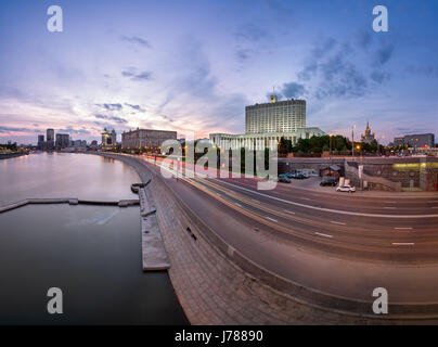 Russian White House and Krasnopresnenskaya Embankment in the Evening, Moscow, Russia Stock Photo