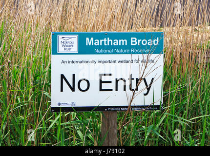 A No Entry sign by the edge of Martham Broad National Nature Reserve in the Broads National Park at West Somerton, Norfolk, England, United Kingdom. Stock Photo