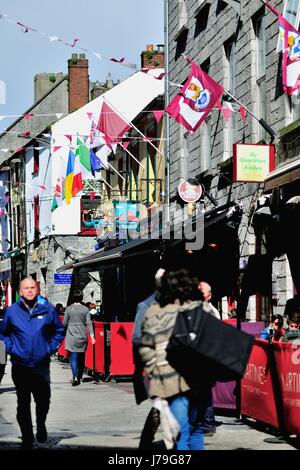 Shops in a narrow passage in Galway, County Galway, Ireland. Galway is an upscale tourist destination in the west of Ireland. Stock Photo