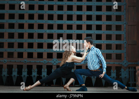 Couple dancing passionate dance. The dancers are young and attractive. See more photos of this series. Stock Photo
