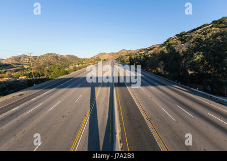 Closed empty ten lane freeway in the San Fernando Valley area of Los Angeles, California. Stock Photo
