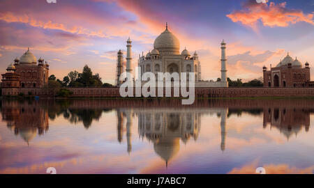 Taj Mahal Agra at twilight from Mehtab Bagh. Taj Mahal is a white marble mausoleum designated as a UNESCO World heritage site at Agra, India. Stock Photo