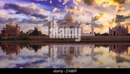 Taj Mahal sunset view from Mehtab Bagh on the banks of Yamuna river. Taj Mahal is a white marble mausoleum designated as a UNESCO World heritage site Stock Photo