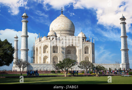 Taj Mahal in closeup view with blue sky and cloudscape - A UNESCO World heritage site. Stock Photo