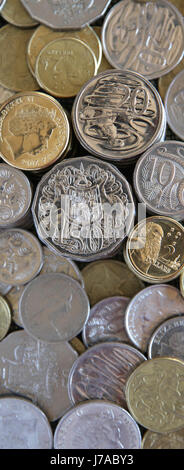 Australian gold and silver coins as background. Stock Photo