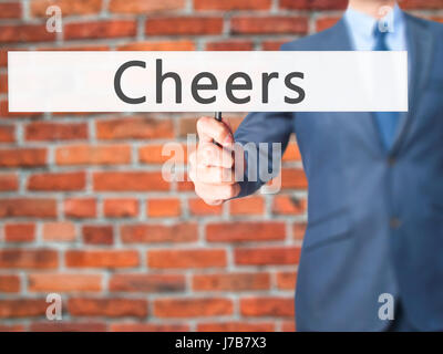Cheers - Businessman hand holding sign. Business, technology, internet ...