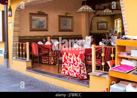 A typical atmospheric Spanish restaurant and cafe with on street and indoor eating facilities in Los Cristianos Tenerife Stock Photo