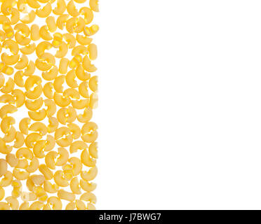 Chifferi pasta background consisting of pasta on the left side and space for text on the right side Stock Photo