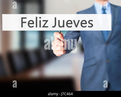 Miercoles (Wednesday In Spanish) Sign On White Paper. Man Hand Holding  Paper With Text. Isolated On Skyscraper Background. Business Concept. Stock  Photo Stock Photo, Picture and Royalty Free Image. Image 77689977.