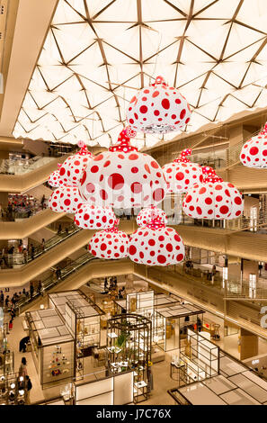 TOKYO - MAY 13 : Ginza Six, a new shopping mall in Ginza district. MAY 13, 2017 in Tokyo, Japan. The mall has a Yayoi Kusama installation Stock Photo