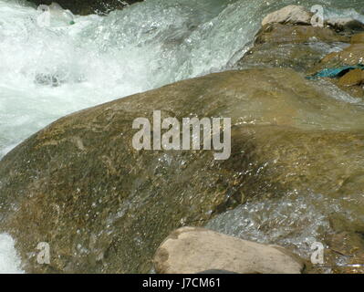 Gange / Ganga River. Rocky Pebble, Rock Mountain, nature, rock, river, stream, flowing, Rishikesh, Himalaya (Photo Copyright © Saji Maramon) Stock Photo