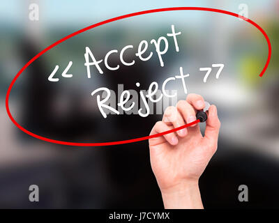 Man Hand writing Accept - Reject  with black marker on visual screen. Isolated on background. Business, technology, internet concept. Stock Photo Stock Photo