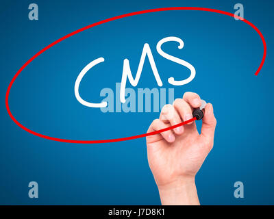 Man Hand writing CMS (Custom Management System) with black marker on visual screen. Isolated on background. Business, technology, internet concept. St Stock Photo