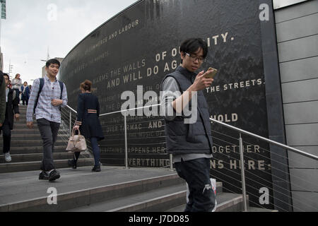 Water feature and poetry wall in Spiceal Street near the Bullring in Birmingham, United Kingdom. Stock Photo