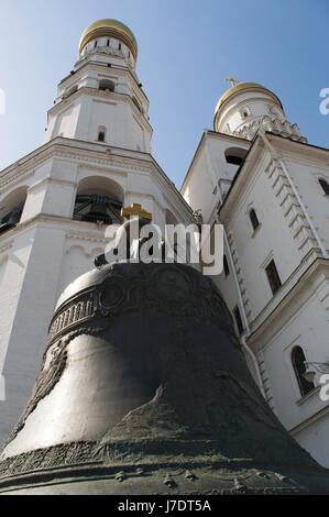 Moscow Kremlin: the Tsar Bell, the largest bell in the world, broken during metal casting and never been rung, and view of Ivan the Great Bell Tower Stock Photo